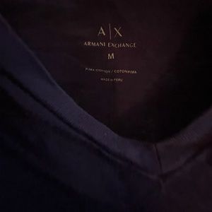 Purple armani exchange shirt .